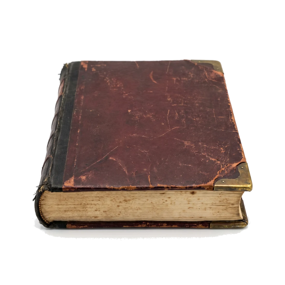 A worn leather-bound ledger book lying closed, its cover scuffed and its page edges foxed.