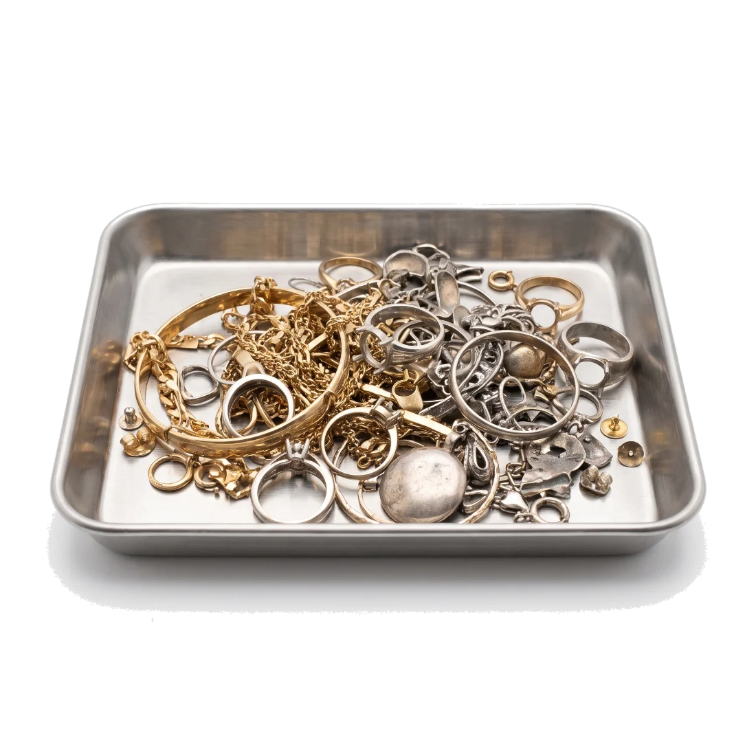 A shallow steel sorting tray holding an unsorted mix of gold chain, white metal mounts and tarnished silver pieces.