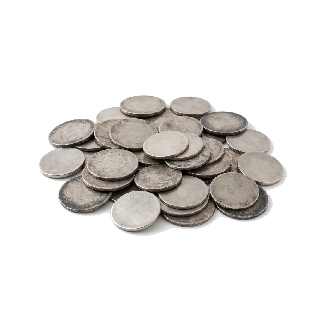 A heap of worn silver coins, their faces rubbed smooth, with dark tarnish in the rims.